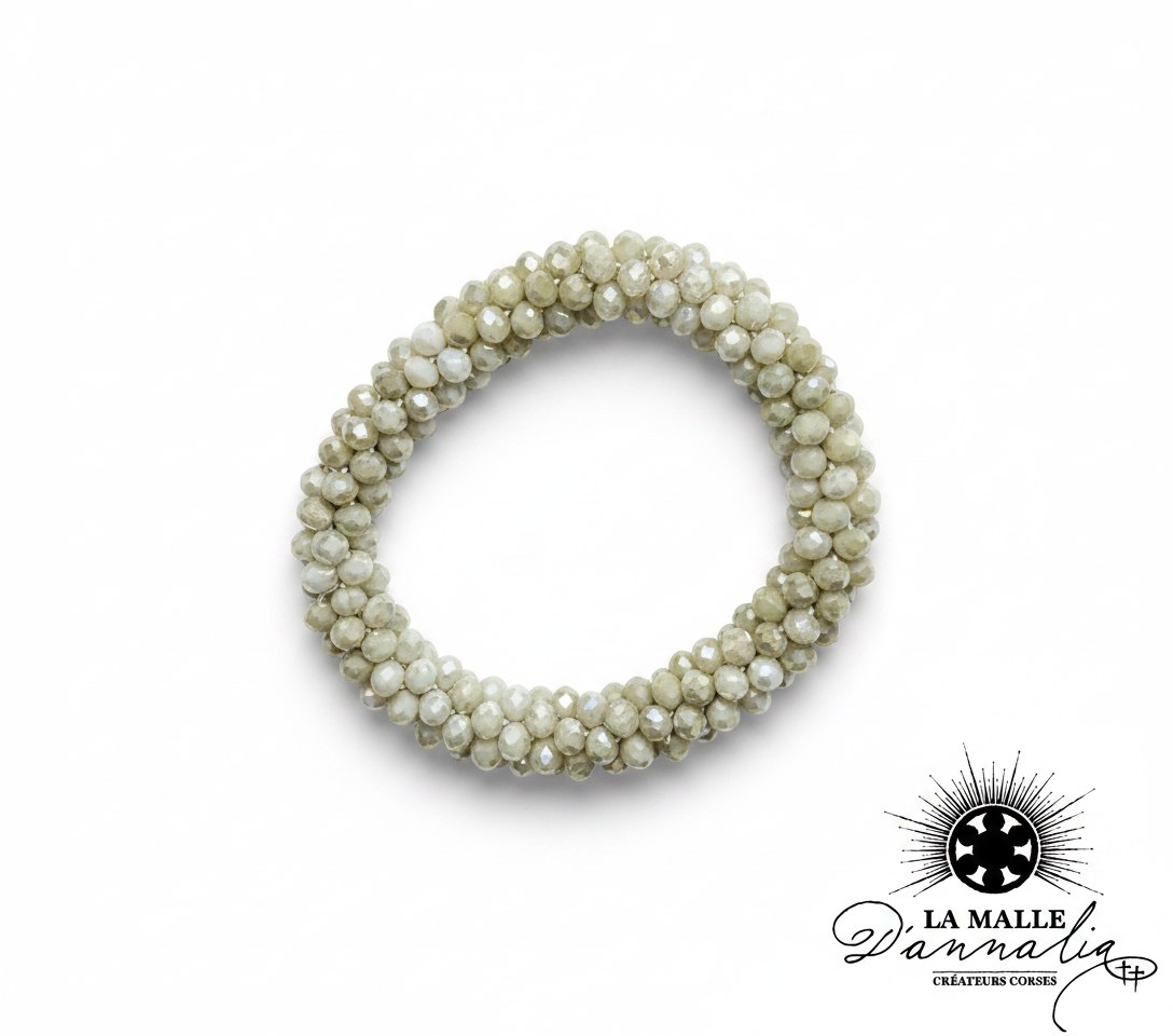 bracelet épais en perles à facettes beige pâle lamalledannalia