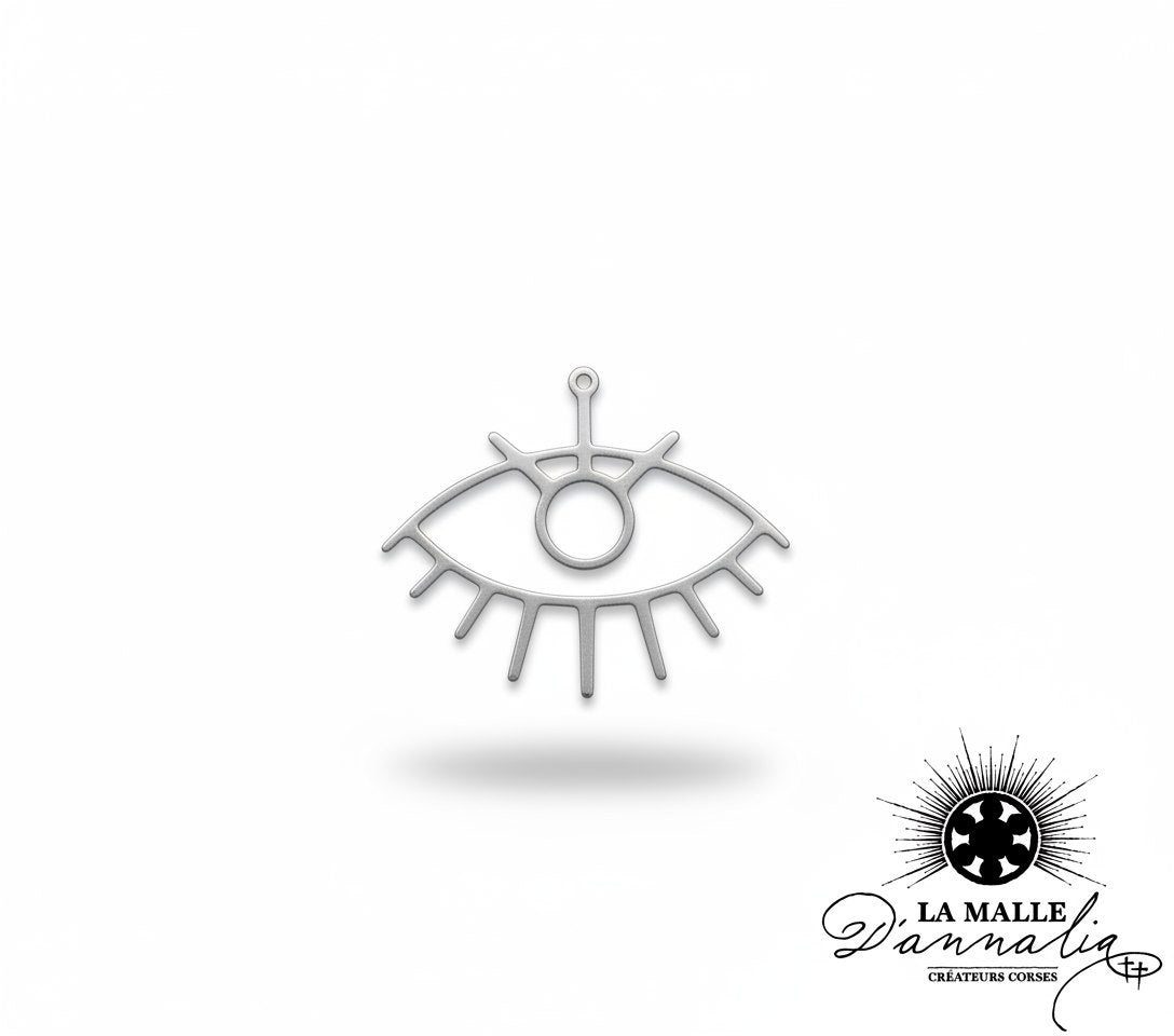 Pendentif œil stylisé en métal argenté lamalledannalia