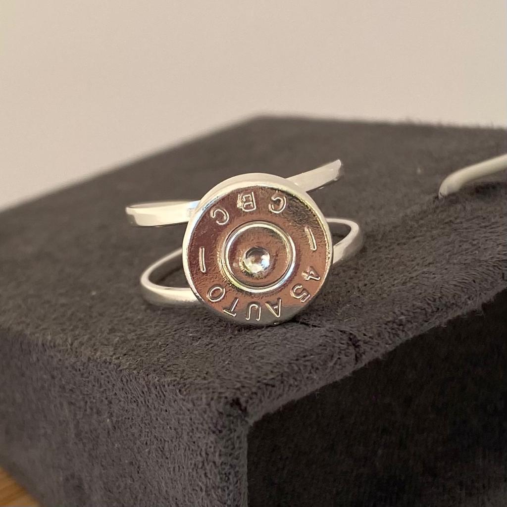 Bague douile de revolver recyclée double anneaux plaqué argent