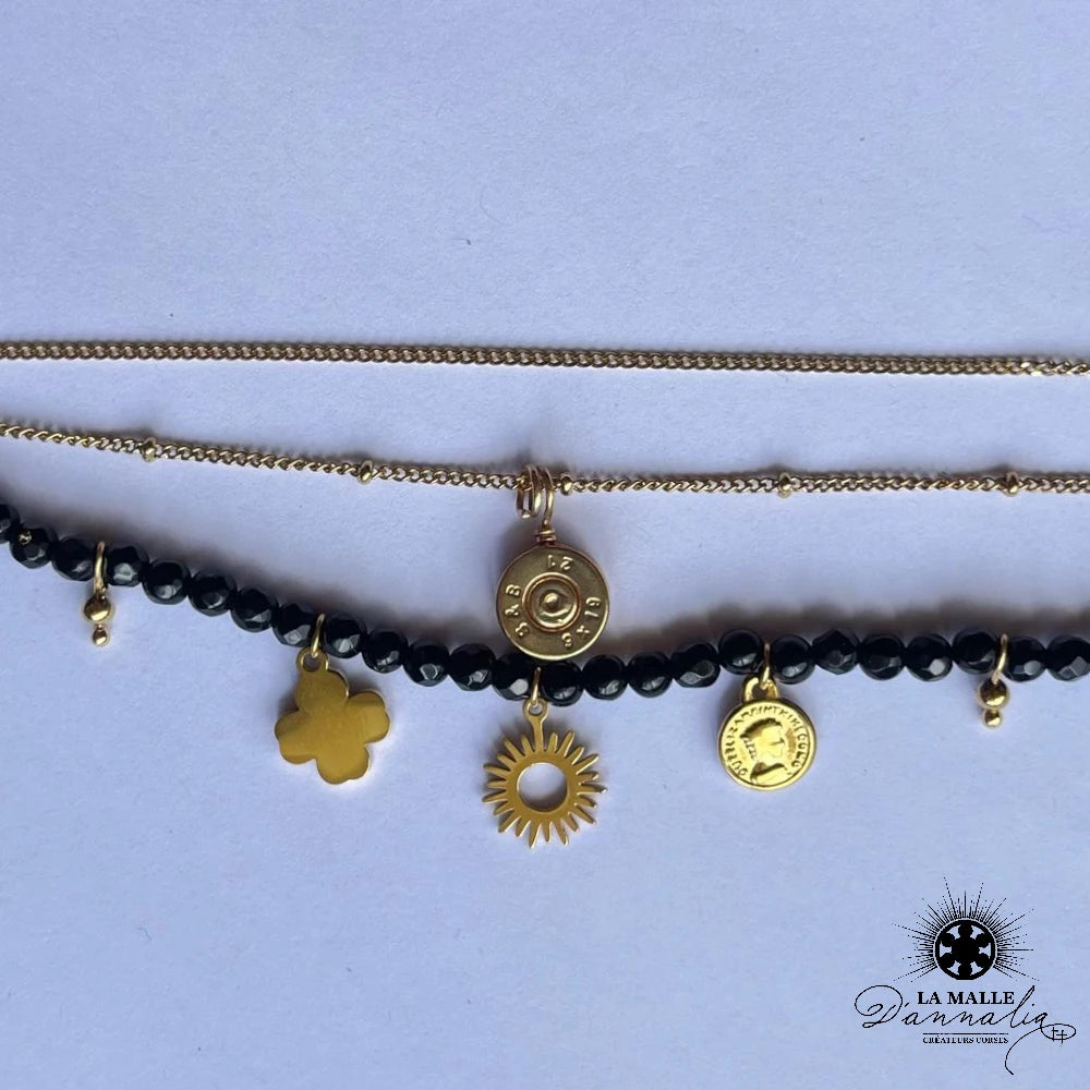 braceletacier-lamalledannalia-bijoux-bracelet-douille-dore-pierre-pampilles-soleil-trefle-perle-noir