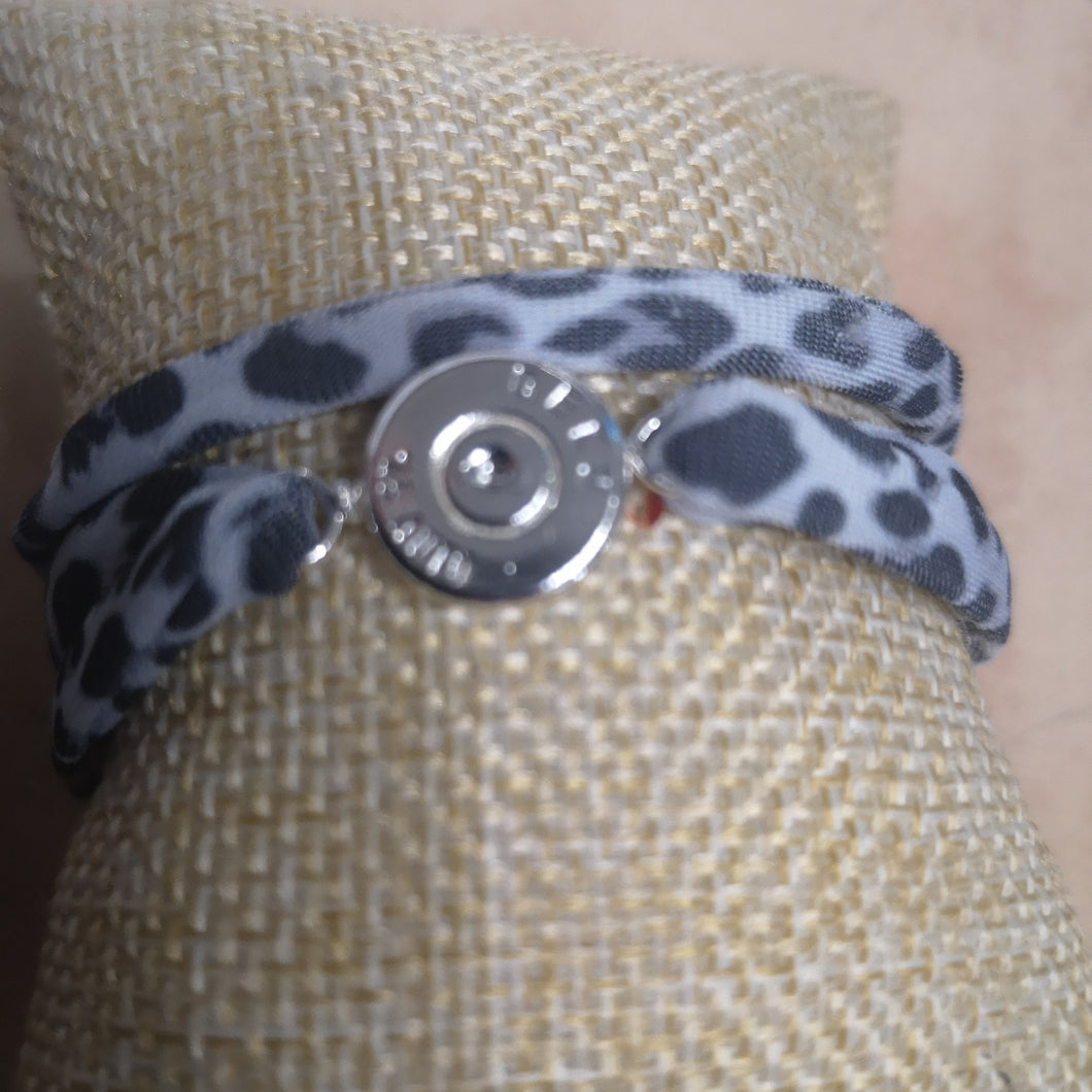 LEOPARD gris: Bracelet  douille plaquee cordon elastique leopard